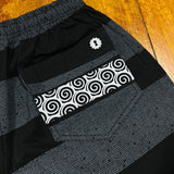 BLACK AND WHITE SPIRAL WALKING SHORTS